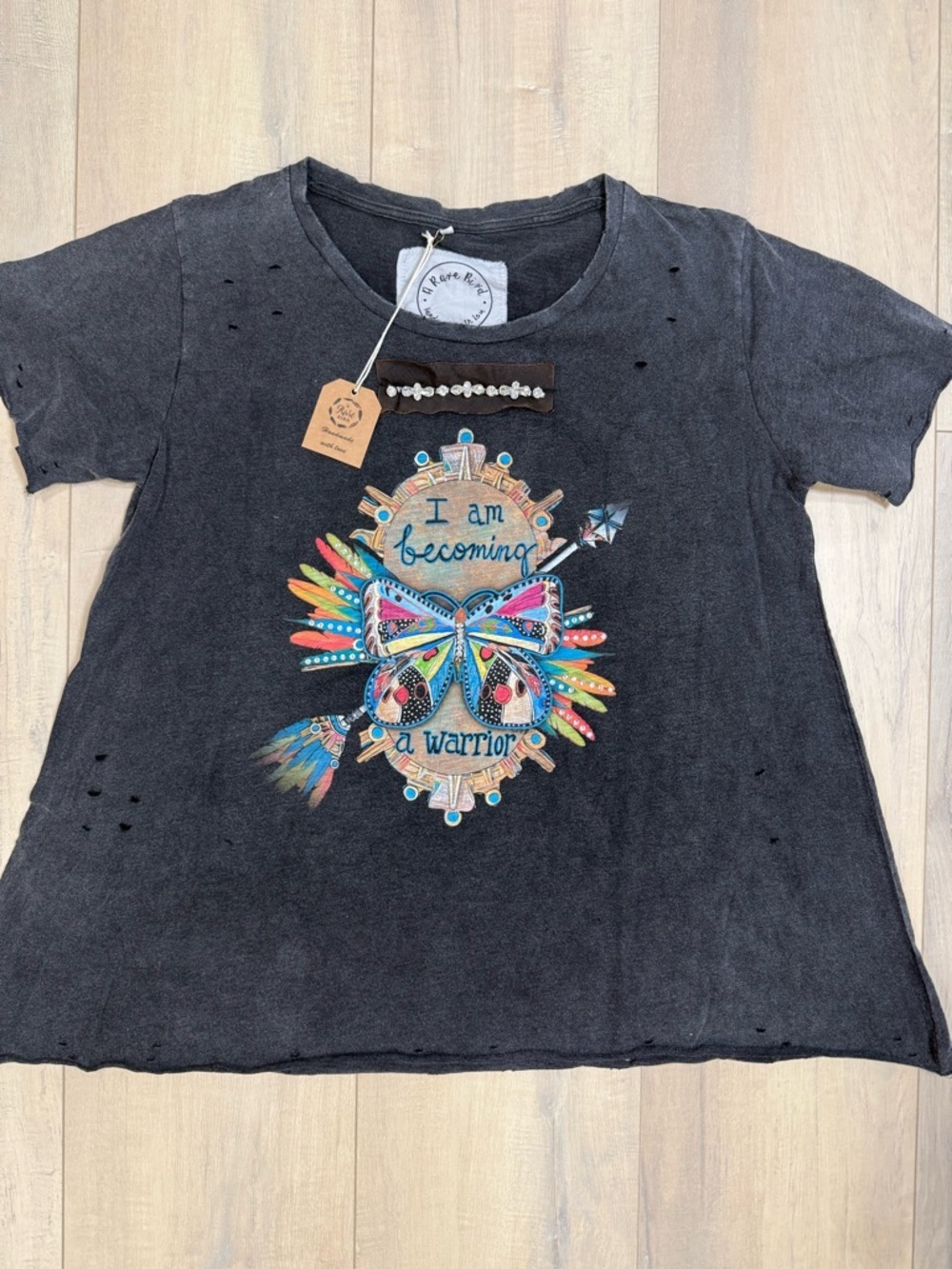 A Rare Bird Butterfly Warrior Tee- size l/Xl